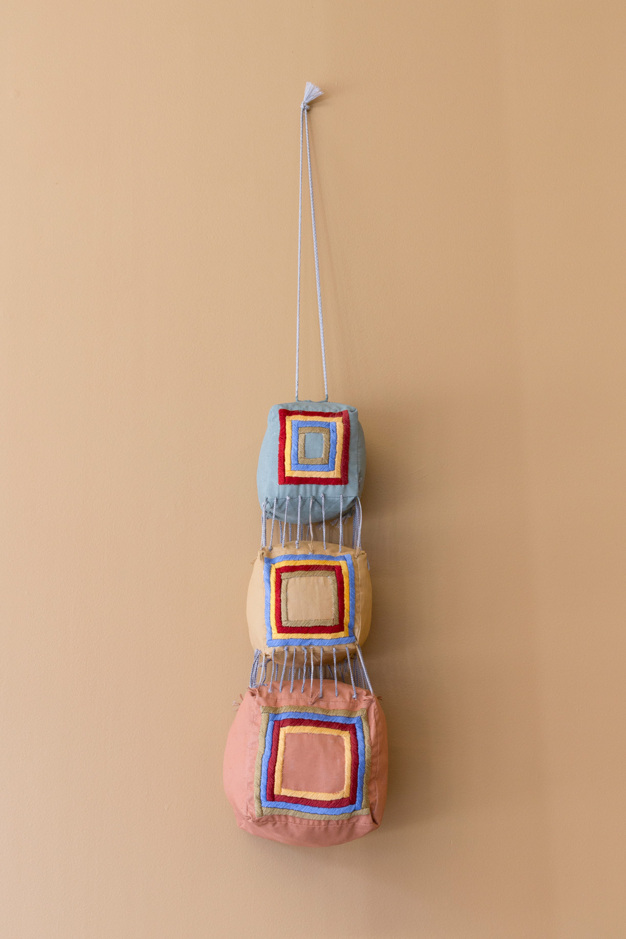 Hanging Cubes With Thin Plaits and Nicely Embroidered Inner Squares