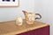 glazed ceramic jug with cup
